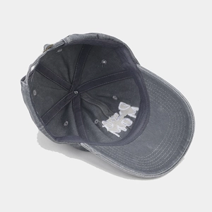 Unisex washed dark grey cotton baseball cap with embroidered Dog Mom logo detail