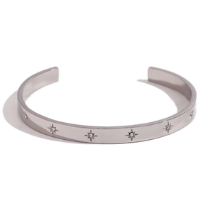 Polished silver stainless steel open bangle with star engraving and zircon accents