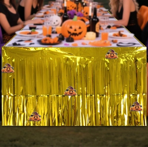 Golden foil fringe table skirt with pumpkin wizard patterns for Halloween party decor