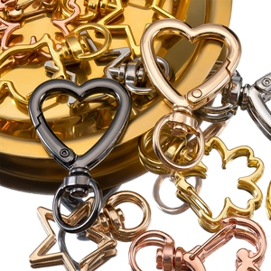 Portachiavi in lega a forma di stella e cuore in finiture oro argento e rosa