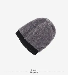 Close-up of winter knit hat featuring thick grey faux fleece lining for thermal warmth