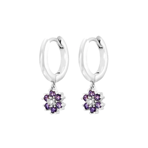Detail of silver flower drop earrings featuring purple and clear zircon crystals