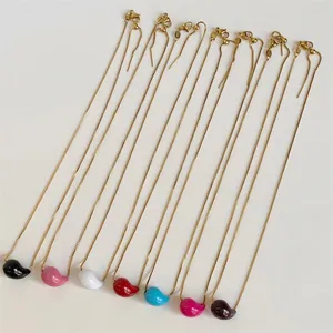 Golden bean necklaces set in seven vibrant colors like black pink blue and red