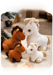 Three sizes of plush pony toys in white and brown colors shown in home setting