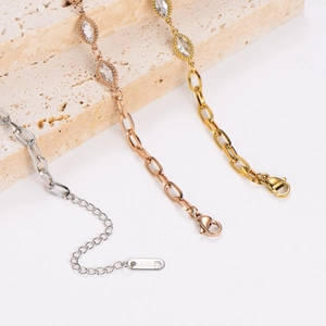 Stainless steel bracelets in gold, silver and rose gold with marquise cut zircon accents