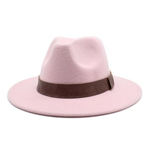 Detail of the pink wool fedora hat with a premium dark brown leather band and buckle