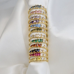 Set of twelve 18K gold-plated minimalist rings with vibrant rectangular zircon birthstones