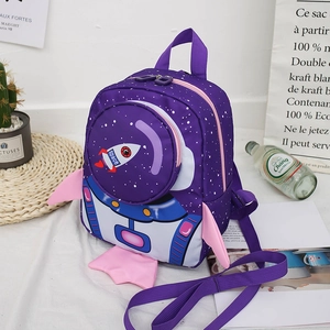 Close-up of purple astronaut backpack featuring 3D wings and space rocket graphics