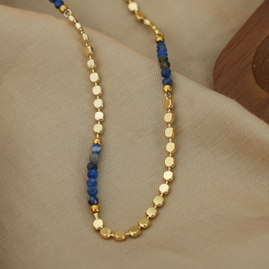 Handmade titanium steel necklace with blue natural stone beads and gold metal accents
