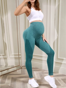 Close-up of high-waisted seamless maternity yoga leggings with breathable knit texture