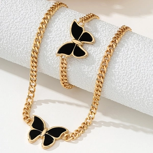 Golden Cuban link chain jewelry set with black butterfly pendants for women
