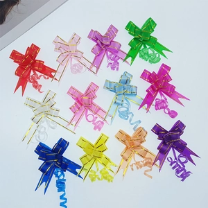Colorful Christmas gift pull bows with gold trim edge for festive holiday packaging