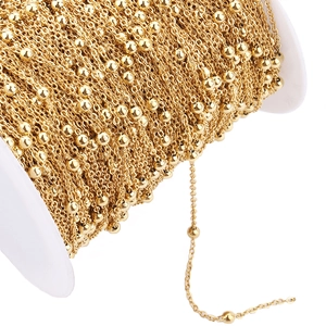 Detail of 18K gold-plated stainless steel bead chain on spool for DIY jewelry making