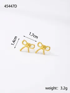 Detailed view of gold bow earrings with precise size measurements and 3.2g weight