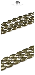 Flachbild von ovalen Pyrit-Perlen mit goldenem Metallglanz für Schmuckherstellung