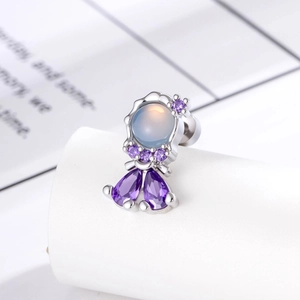 Mermaid style silver ear stud with opal and purple pear-shaped zirconia crystals