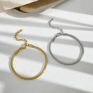 Sleek gold and silver snake chain bracelets in stainless steel with adjustable lobster clasp