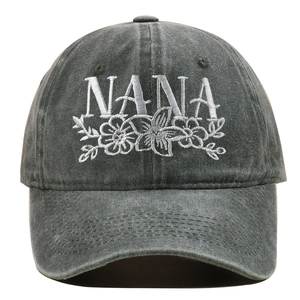Close-up of charcoal grey baseball cap with white NANA embroidery and floral design