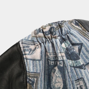 Detail of black PU leather stitching with vintage blue print fabric and elastic hem