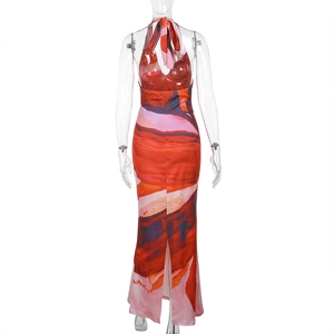 Back view of a deep V-neck halter maxi dress featuring vibrant abstract floral prints