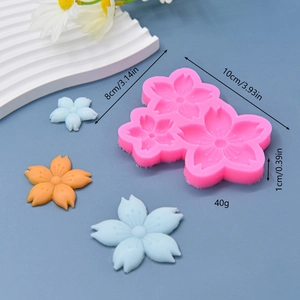 Pink silicone cherry blossom mold for 3D cake decoration and DIY baking projects