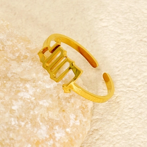 Detailed view of an 18K gold-plated adjustable ring featuring Virgo gothic font design