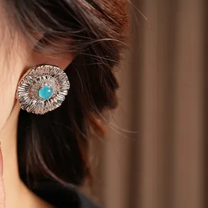 Vintage silver sunflower earrings with blue stone and zirconia in a luxury design