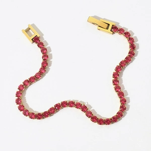 Classic gold-plated tennis bracelet with sparkling red cubic zirconia stones in a prong setting