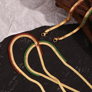 Detail of 18K gold-plated herringbone chain with red and green zircon inlay work