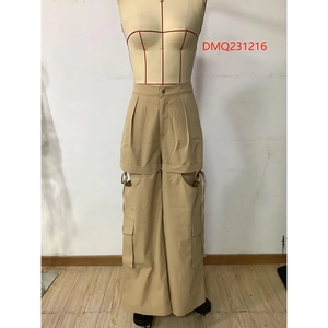 Close-up of khaki cargo pants featuring cutout thigh details and drawstring accents