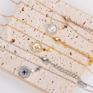 Star pendant necklace set in rose gold, gold, and silver finishes with crystal accents