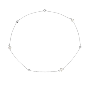 Detail view of silver necklace with fresh water pearls and sparkling zircon stones