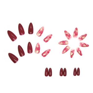 Almond burgundy marble press-on nails with gold foil accents for festive manicures