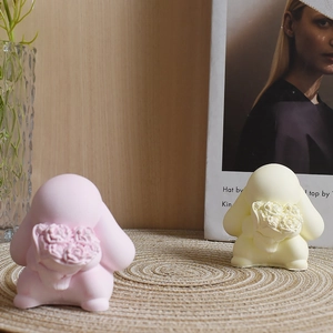 Detail of pink and white bunny silicone molds for DIY floral scented candles