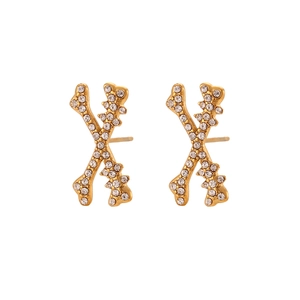 X-shaped bone earrings in gold finish with sparkling crystals on white background