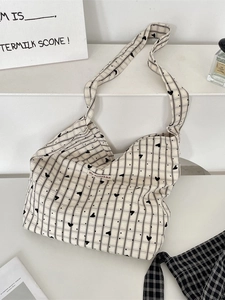 Borsa tote minimalista in tela color crema con strisce nere e motivi a cuore