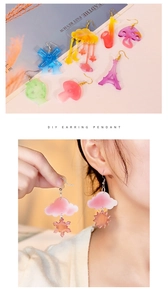 Selection of colorful acrylic DIY earring pendants in mushroom, cloud and tower shapes