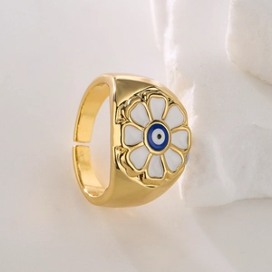 Bohemian gold-plated flower ring with blue evil eye design and adjustable open band