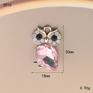 Pink owl pendant with drop-shaped crystal and sparkling rhinestones in silver finish