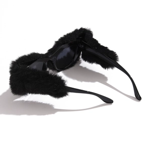 Cat eye sunglasses with black faux fur and rhinestones on classic black frame