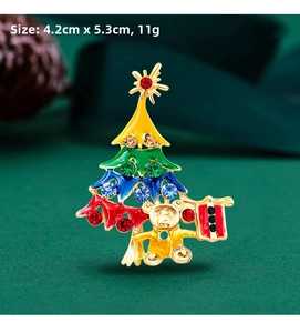 Detail view of colorful Christmas tree brooch with golden bear, size 4.2cm x 5.3cm