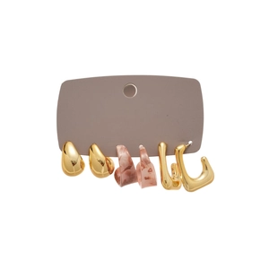 Set of three stylish earrings including gold studs and pink marble resin hoops