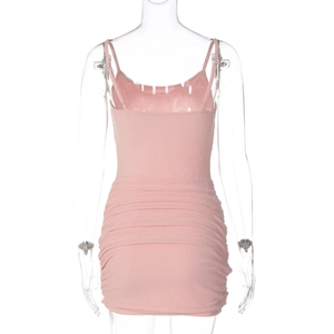 Detailed back view of pink ribbed mini dress featuring ruched design and bodycon fit