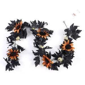 Detail of Halloween maple leaf garland with sunflowers, mini pumpkins and LED battery box