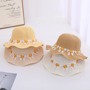 Adorable children's summer straw sun hats featuring delicate daisy lace decoration