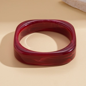 Detailed view of dark red marble resin square bangle showing unique stone texture