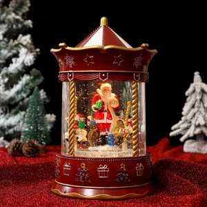 Christmas carousel musical snow globe with Santa Claus, LED lights, and music