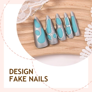 Stiletto press-on nails with matte metallic grey base and turquoise liquid texture design
