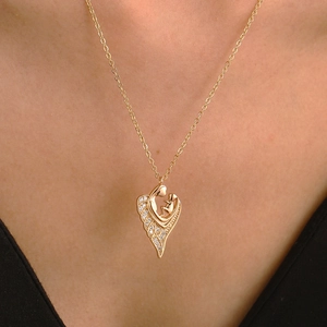 Golden heart necklace with mother and child pendant and 100 languages projection stone