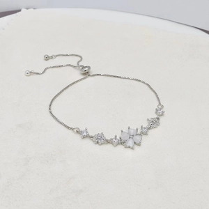 Silver four-leaf clover cat's eye bracelet with adjustable slider clasp for women